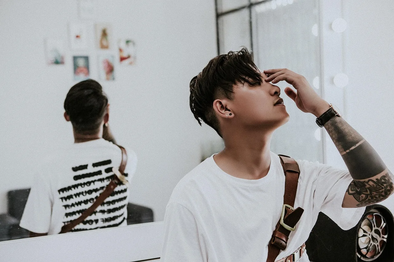 man, fashion, portrait, boy, tattoo, tattooed arm, pose. Tattoo Apprentice Laws in Ontario Explained