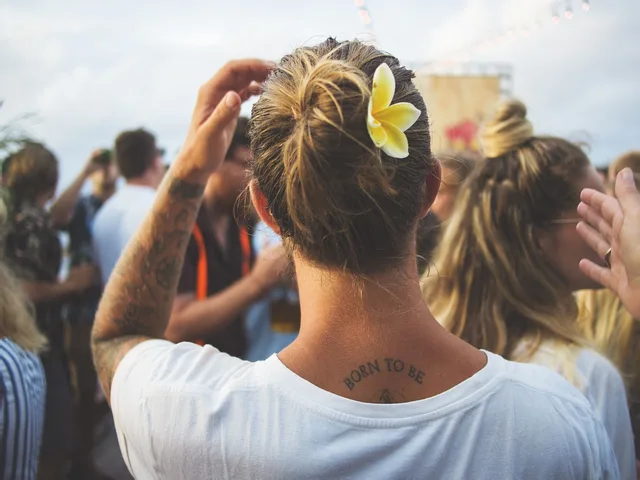 people, crowd, back, tattoo, arm, blur. Planning a US studio calendar around tattoo convention season and tourism