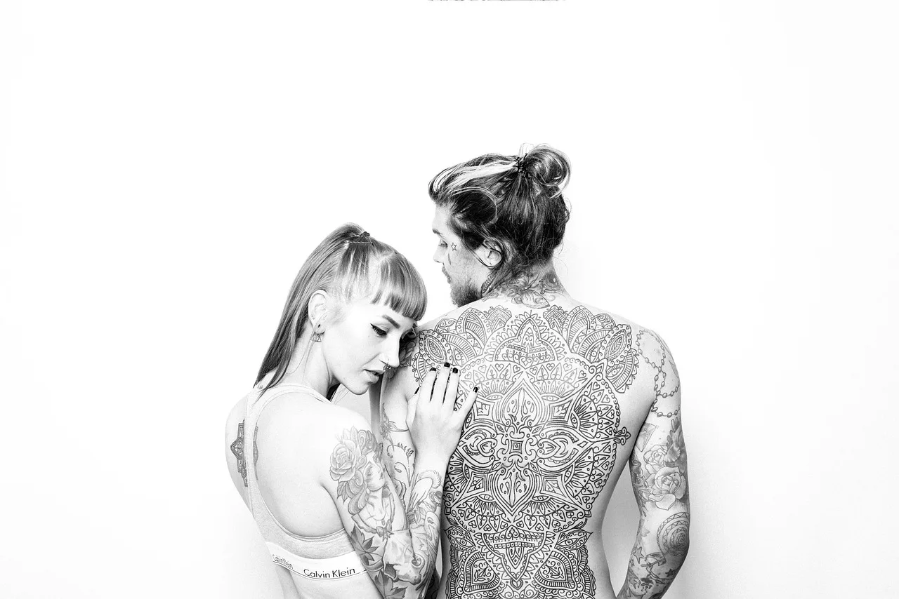 tattoos, couple, portrait, lovers, body, skin, adults, together, relationship, body art, love, man, woman, models, people, romance, black and white, monochrome, studio photography, tattoos, tattoos, couple, couple, couple, lovers, lovers, lovers, lovers, lovers, body, body, skin, relationship, love, people, people, romance. How much does a tattoo session cost in Los Angeles?
