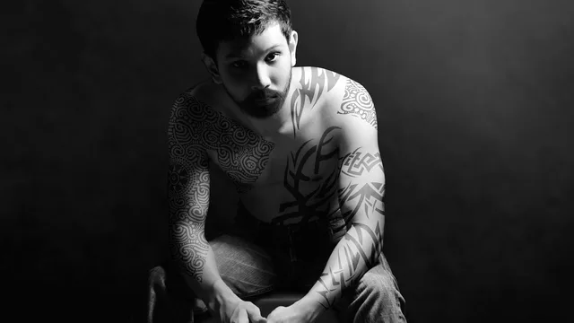man, guy, tattoo, person, dark, back and white, model, beard, adult, handsome, attractive, asian, male, jean, thai, teen, sitting, studio, light, angry, serious, black, white, gray light, gray model, gray angry, gray dark, gray lights. How a tattoo studio tracks cash flow week to week for owner-operators