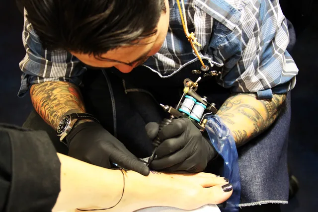 Artist Tattoo. Tattoo studio business insurance basics