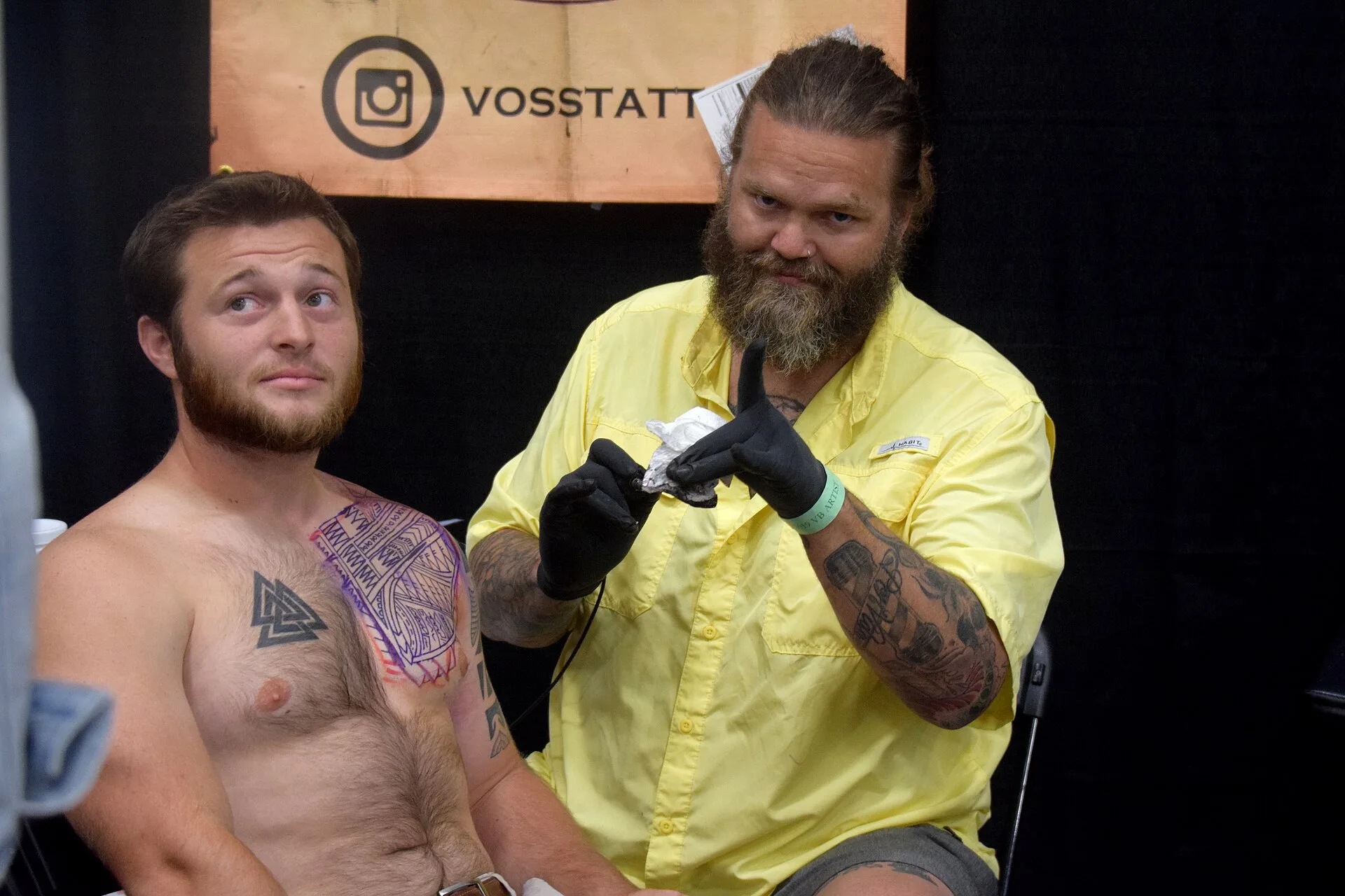 Tattooer Jason Voss from Michigan - quite the tattoo artist. His client is a bit furry. Tattoo studio operations: what to keep and what to drop