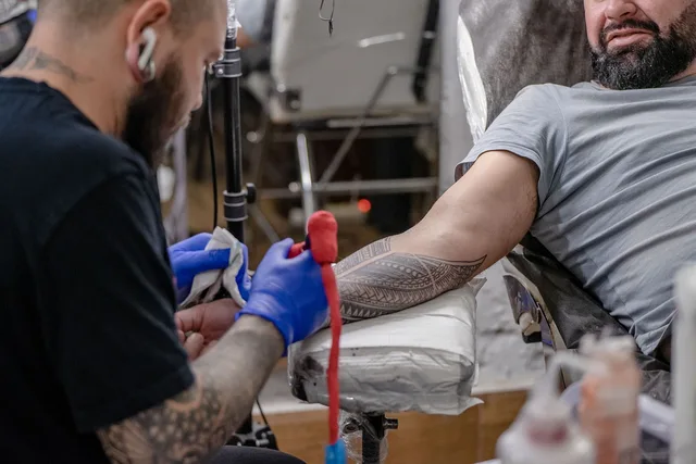man, tattoo, skin, art, ink. What drives tattoo studio pricing, and what does not