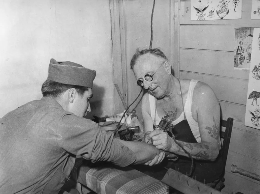 Young American soldier gets his first tattoo, Brisbane, 1943. The margin math behind a tattoo studio, explained
